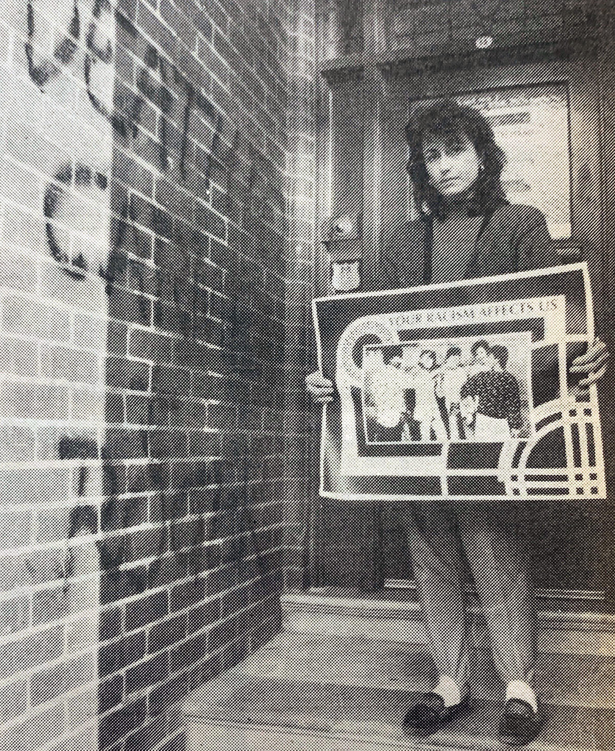 Image of Carmel Guerra beside graffiti as appeared in Talbot D. 1989. ‘Death Threats Against Youth Workers Spark Anger and Concern’, Coburg Courier, 20 June 1989, p1.